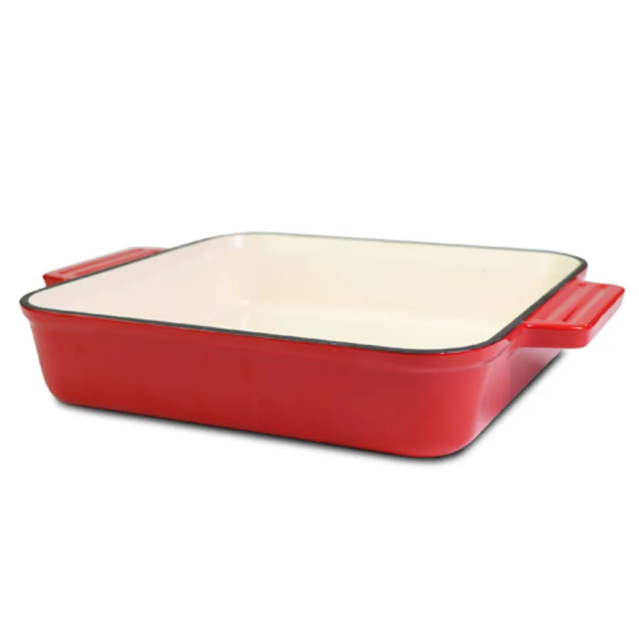 Red cast iron oven dish with a cream-coloured enamel interior.