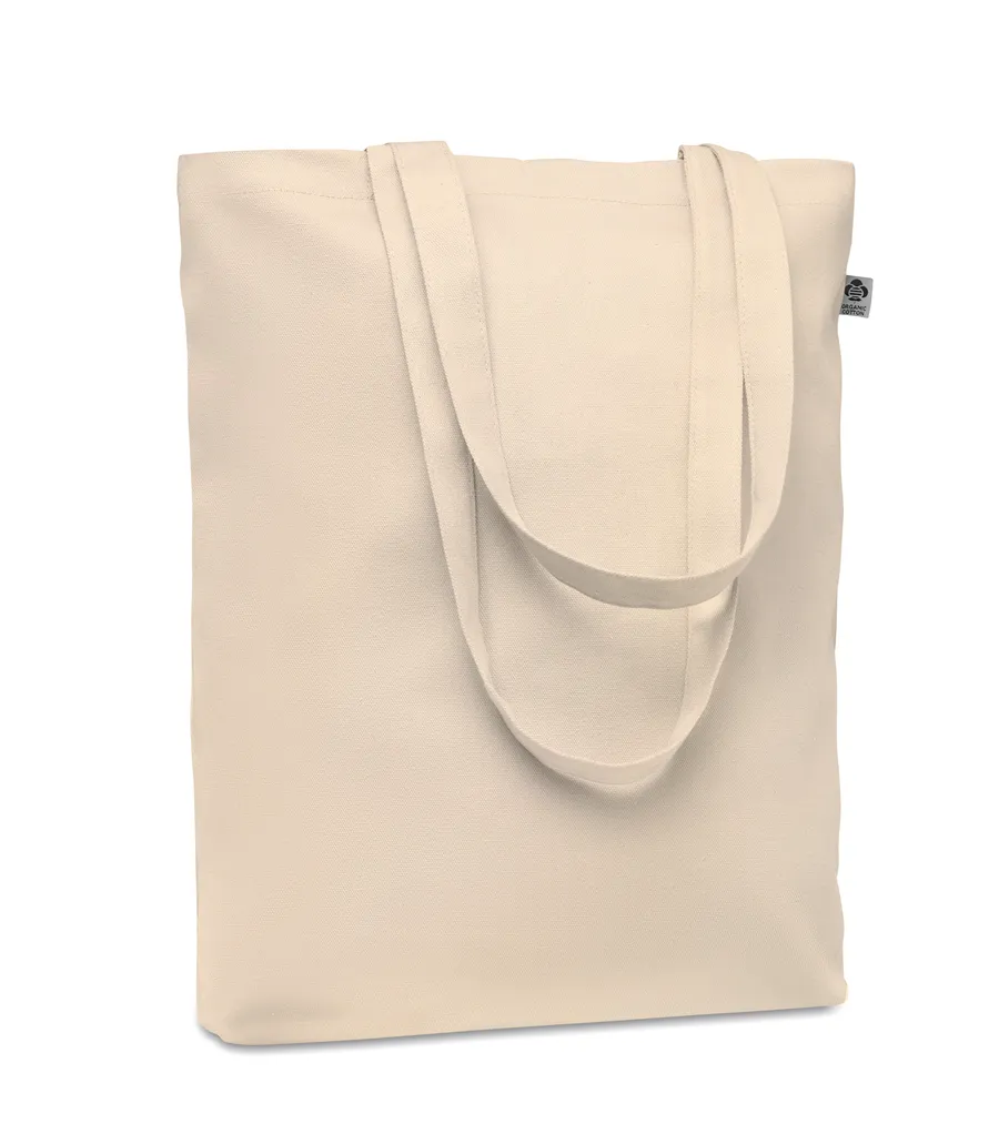 Beige luomupuuvillainen ostoskassi pitkillä kahvoilla.
