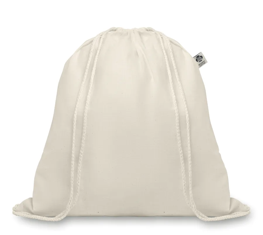 Beige luomupuuvillasta valmistettu narureppu pitkillä kiristysnyöreillä.