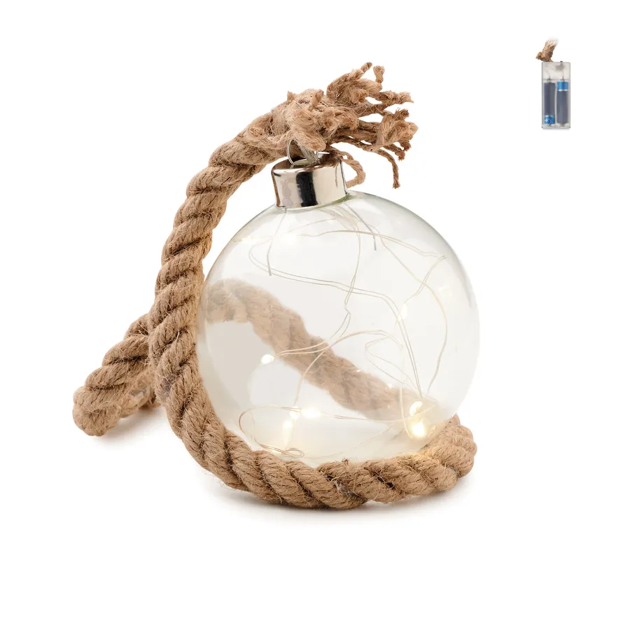 Läpinäkyvä lasinen joulupallo juuttinarulla ja sisällä palavilla lämpimillä LED-valoilla.