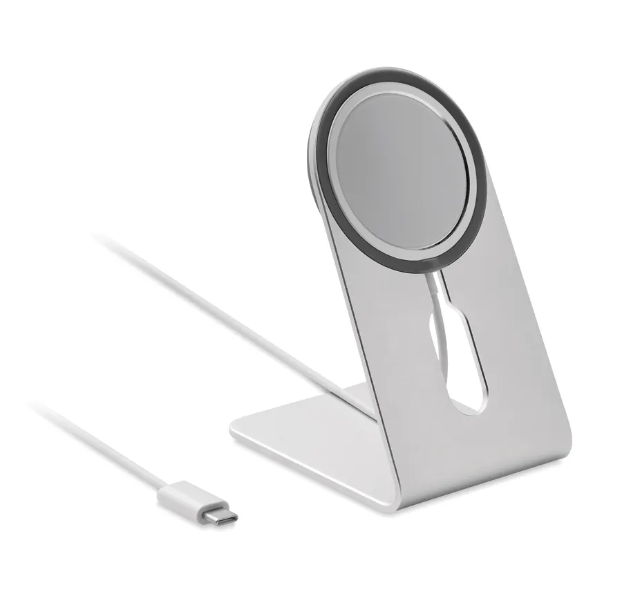 Hopeanvärinen alumiininen magneettinen langaton laturi ja puhelinpidike sekä valkoinen USB-C-johto.