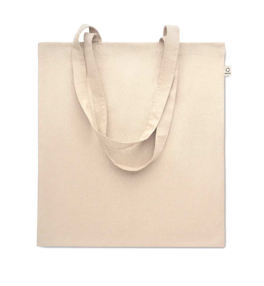 Beige kangaskassi pitkillä kantokahvoilla.
