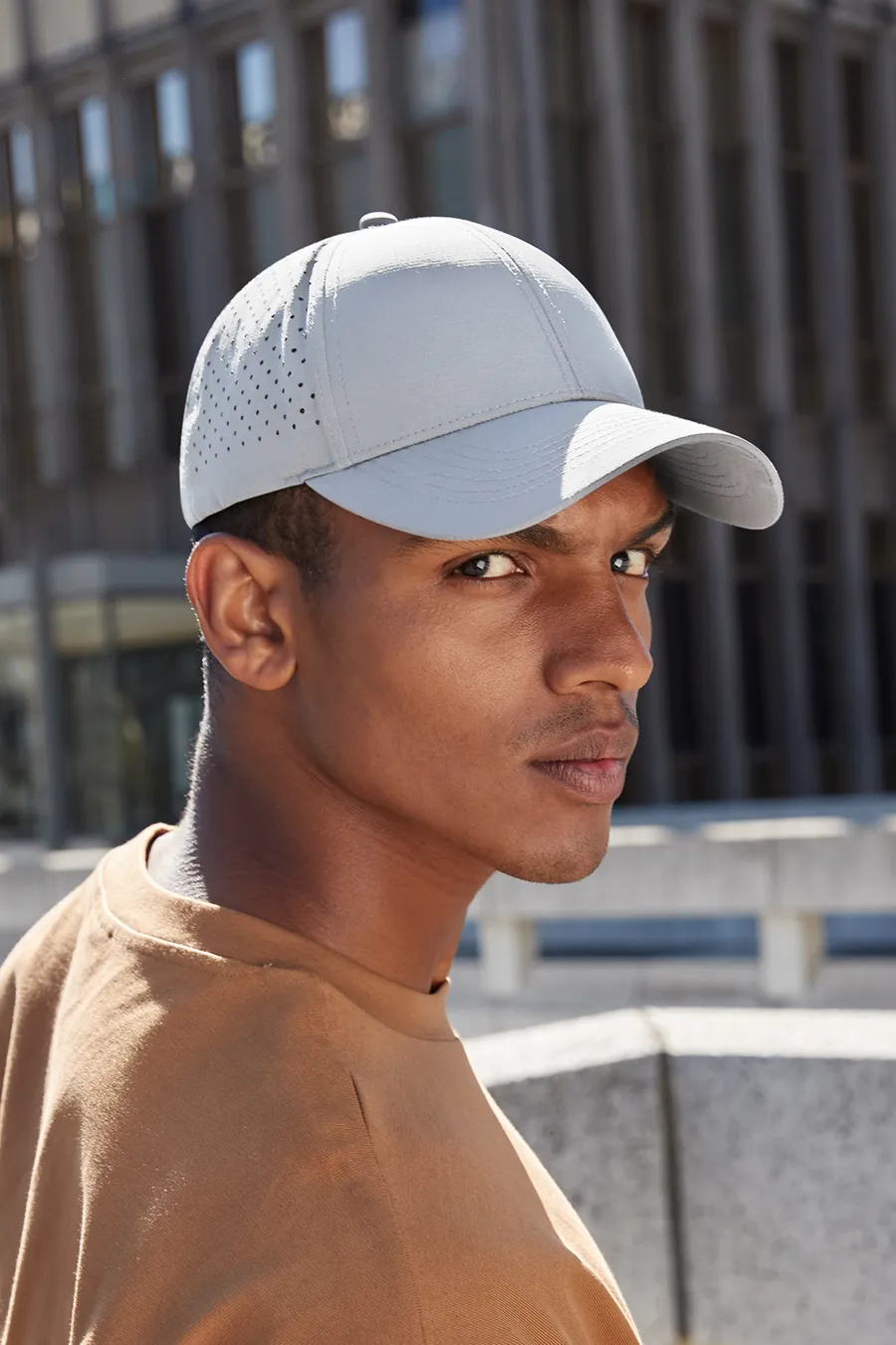 Laser performance trucker cap