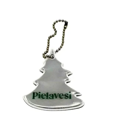 Silver-coloured fir-tree-shaped soft reflector with a ball chain, printed with the text "Pielavesi".