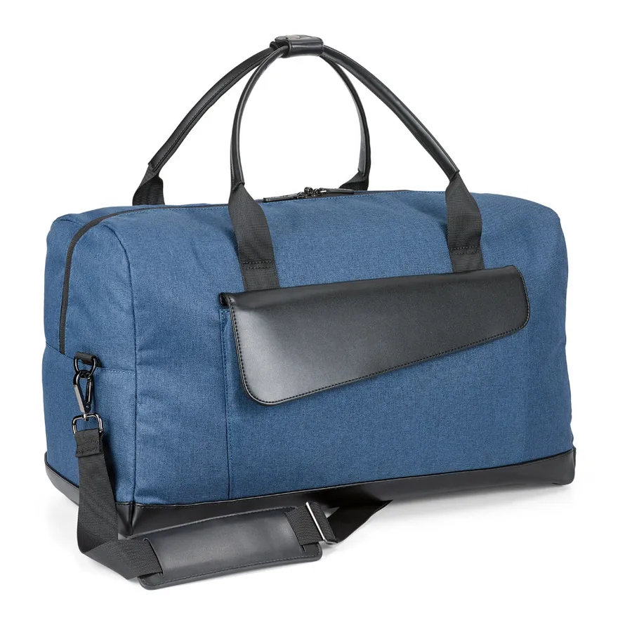 Sininen Motion Bag -matkalaukku, jossa musta etutasku, kantokahvat ja olkahihna.