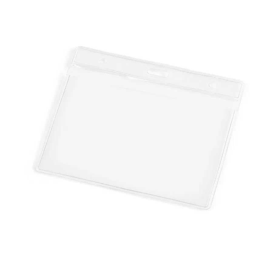 Läpinäkyvä vaakasuora PVC-merkinpidike, jonka yläreunassa on kiinnitysaukot.
