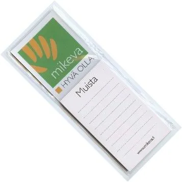 Fridge magnet and notepad in plastic packaging, green logo print.