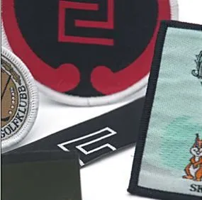 Woven fabric badges in various shapes and colours with logo and pattern designs.